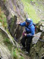 Abseiling off Dinas Mot in rain