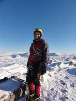 No wind, No cloud - Miles of views. Andy happy after The Haston Line.  [Jim Symon]