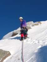 Jim, topping out from The Haston Line III,4 on another beautiful day, Coire an-t Sneachda  [Andy Stratford]