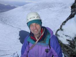Jim, happy after lunch at the top of pitch 6, Staghorn Gully III  [Andy Stratford]