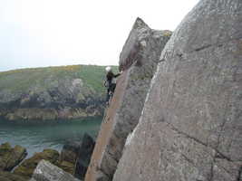 Dave leading Red Wall, Porth Clais
