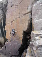 Sheena leading Red Wall, Porth Clais