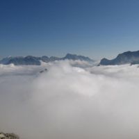 Cloud inversion, looking across Bregalia valley with Spazzacalderia summit just sticking out of clouds in centre of photo (James Richardson)