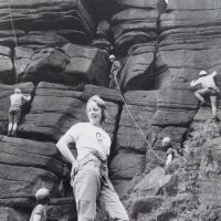 14 Sandy Gregson at Stanage - KMC Sponsored Climbing Day fund-raising event 1974 (during which 130 routes were soloed by Alf Gleadell & John Whittle) (Derek Seddon Collection)