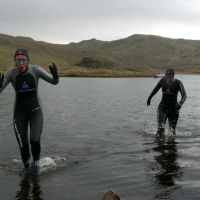 Midge and Joanne in Angle Tarn, Patterdale (Virginia Castick)
