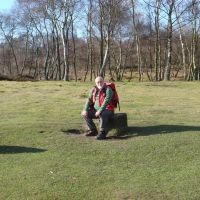 John gets comfortable on one of the Nine Ladies.JPG (Dave Shotton)