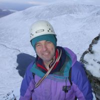 Jim, happy after lunch at the top of pitch 6, Staghorn Gully III (Andy Stratford)