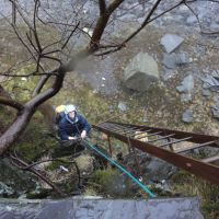 Lucie climbing some old ladders (Andy Stratford)