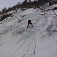 Jim on the third of the five full length abseils off Fabrikkfossen (WI3) (Andy Stratford)