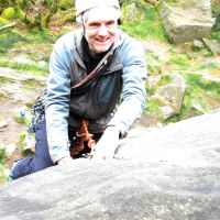 Dave rocketing up Sunset Crack (Roger Dyke)