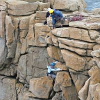 Lucie in the overhangs of Civvy Route (I think!!!) at Sennen (Roger Dyke)