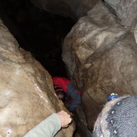 Andy and Al going through the cave (Dave Wylie)