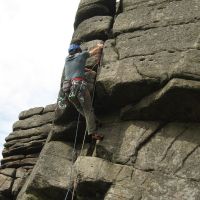 Going for it on the crux of Agony Crack (Roger Dyke)