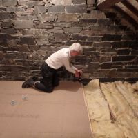 Dave W fitting loft boards (Dave Shotton)