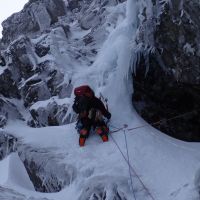 Andy on the crux icicle of Minus Three Gully (IV,5) (Steve Graham)