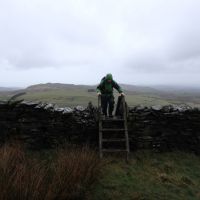 Joe on stile overlooking Llyn Du (Dave Shotton)