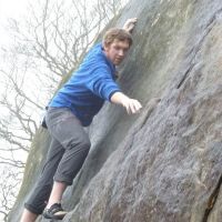 Stanage Plantation.  Dan discovers the drizzle has shrunk his arms (Roger Dyke)