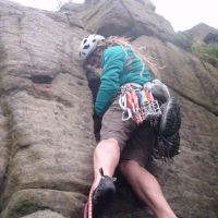 Duncan fiddles something into a crack on Pillar Cracks. (Colin Maddison)