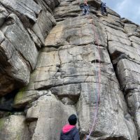 Cathy belaying Andy Pierce on Easter Rib (E1 5b) (Georgia Dowler)