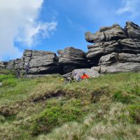 Lunch time at Path Side Buttress: Cathy and Gowry still climbing whilst food passes the event horizon into the spacetime singularity that is Jim's snack-hole (Gareth Williams)