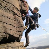 Ian follows Jim up Overhanging Arete Pule Hill S4a. (Andy Stratford)