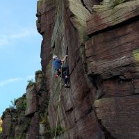 Jack jamming hard on 3 star VS Phoenix climb (Andy Stratford)