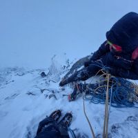 Mich climbing a super steep icy groove on Fingers Ridge IV,5 with Stuart on belay (Andy Stratford)