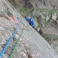 With frozen hands Jess rushes to beat the incoming rain (Andy Stratford)